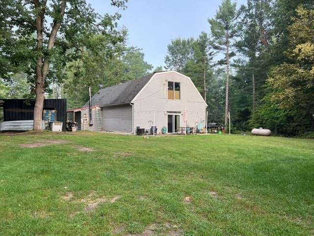 Photo of 700 S Jackson Avenue, Harrison, MI 48625 (MLS # 50220582)