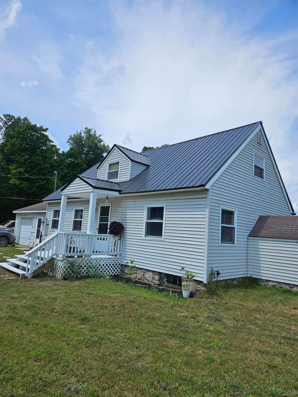 Photo of 9195 E Arnold Lake Road, Harrison, MI 48625 (MLS # 50185679)