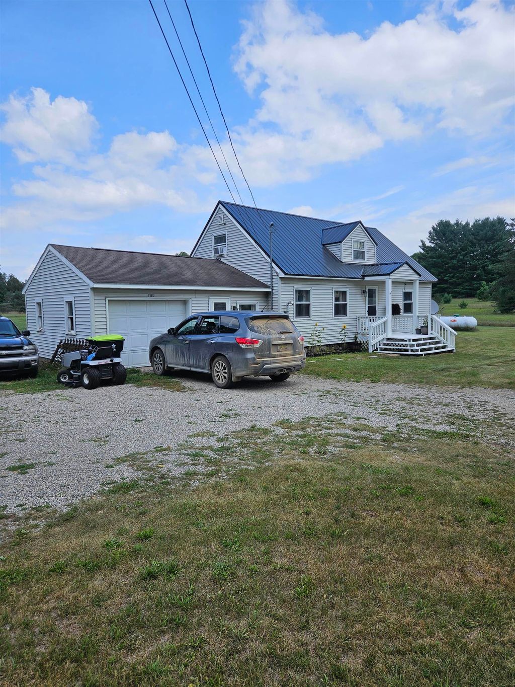 Photo of 9195 E Arnold Lake Road, Harrison, MI 48625 (MLS # 50185679)