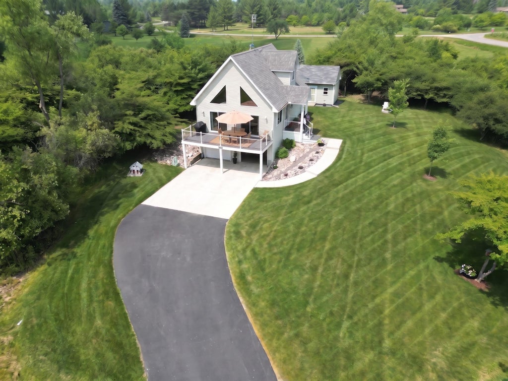 Photo of 5228 Winchester Way, Gladwin, MI 48624 (MLS # 50220194)