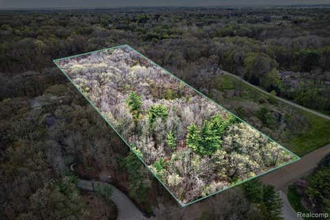 Photo of 6944 Cooley Lake Road, White Lake, MI 48383 (MLS # 60989101)