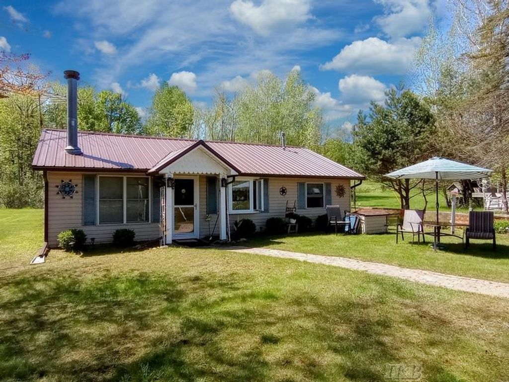 Photo of 519 E Sun Oil Road, Gladwin, MI 48624 (MLS # 50203008)