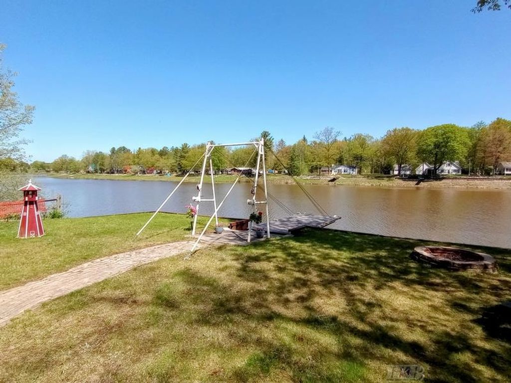 Photo of 519 E Sun Oil Road, Gladwin, MI 48624 (MLS # 50203008)