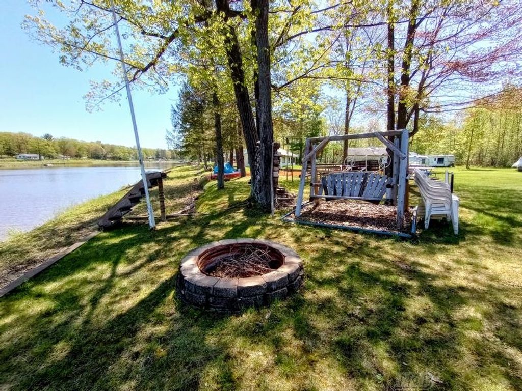 Photo of 519 E Sun Oil Road, Gladwin, MI 48624 (MLS # 50203008)