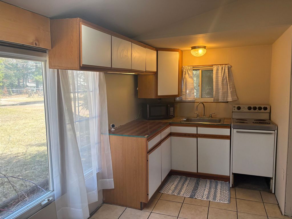 Photo of 4215 Oak Flats Road, Harrison, MI 48625 (MLS # 50203076)