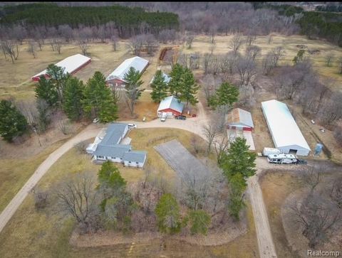 Photo of 7214 S M 66 Highway, Mancelona, MI 49659 (MLS # 60976229)