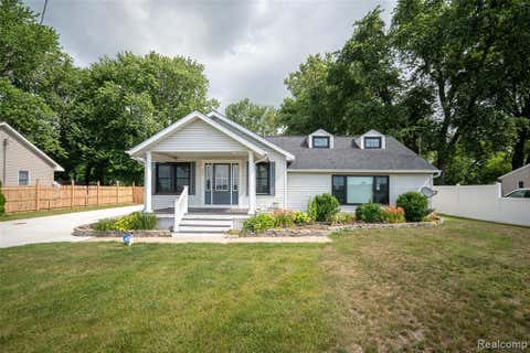 Photo of 354 W Erie Road, Temperance, MI 48182 (MLS # 61009373)