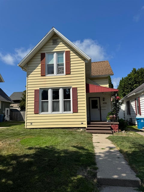 Photo of 370 4th Street, Manistee, MI 49660 (MLS # 80073340)