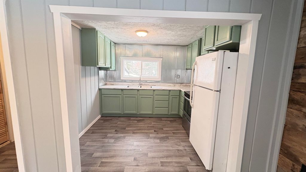 Photo of 2469 N Dodge Lk Road, Harrison, MI 48625 (MLS # 50198612)