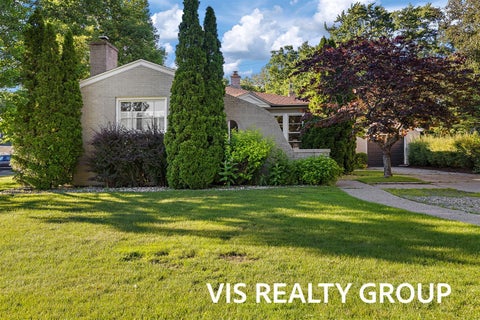 Photo of 303 E Savidge Street, Spring Lake, MI 49456 (MLS # 70541764)
