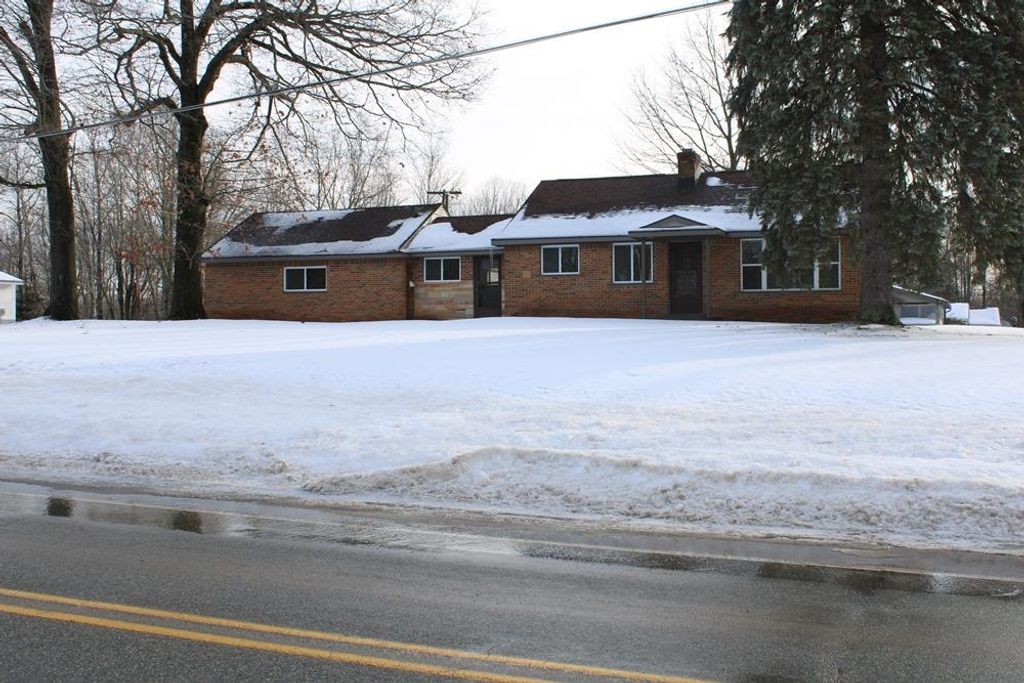 Photo of 5020 E Arnold Lake Road, Harrison, MI 48625 (MLS # 50197574)