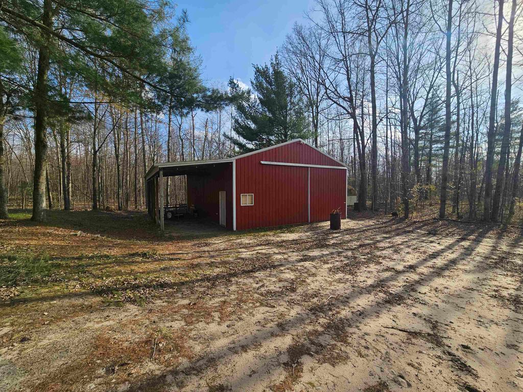 Photo of 1881 W Haskell Lake Road, Harrison, MI 48265 (MLS # 50207825)