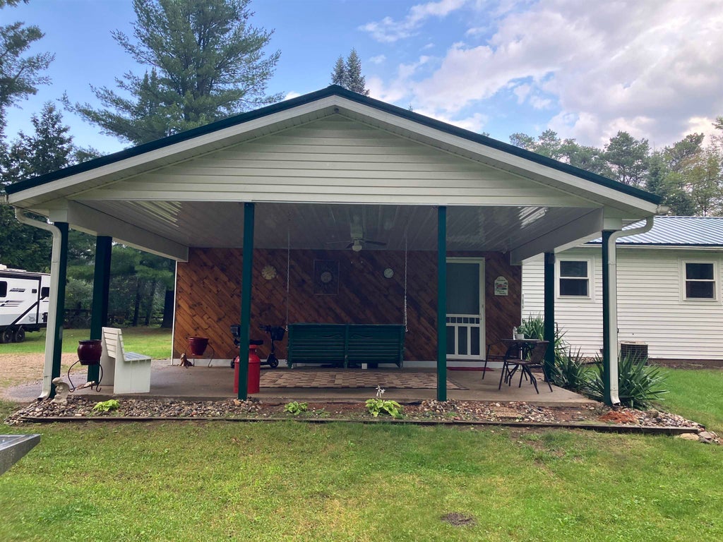 Photo of 395 W M61 Highway, Gladwin, MI 48624 (MLS # 50220480)