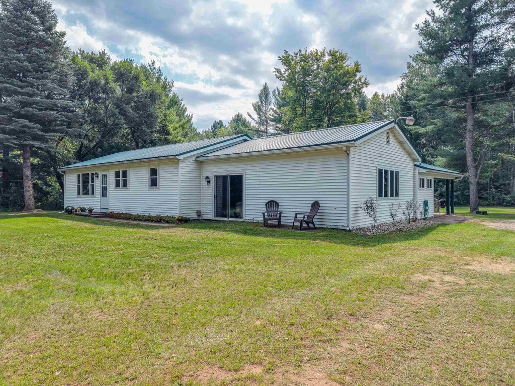 Photo of 395 W M61 Highway, Gladwin, MI 48624 (MLS # 50220480)