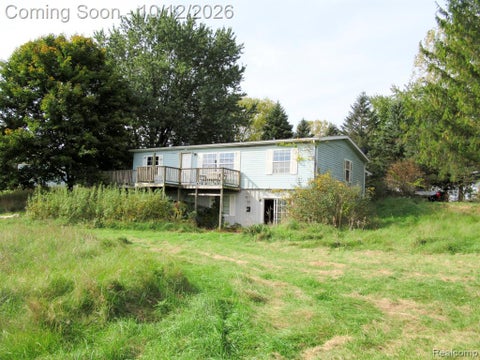 Photo of 6191 Oliver Road, Fostoria, MI 48435 (MLS # 61037828)