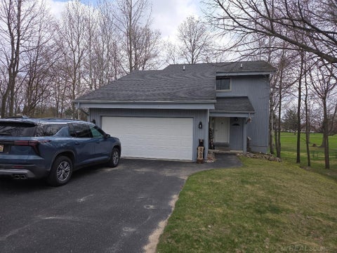 Photo of 5700 Royal Court Court, Butman, MI 48624 (MLS # 50205001)