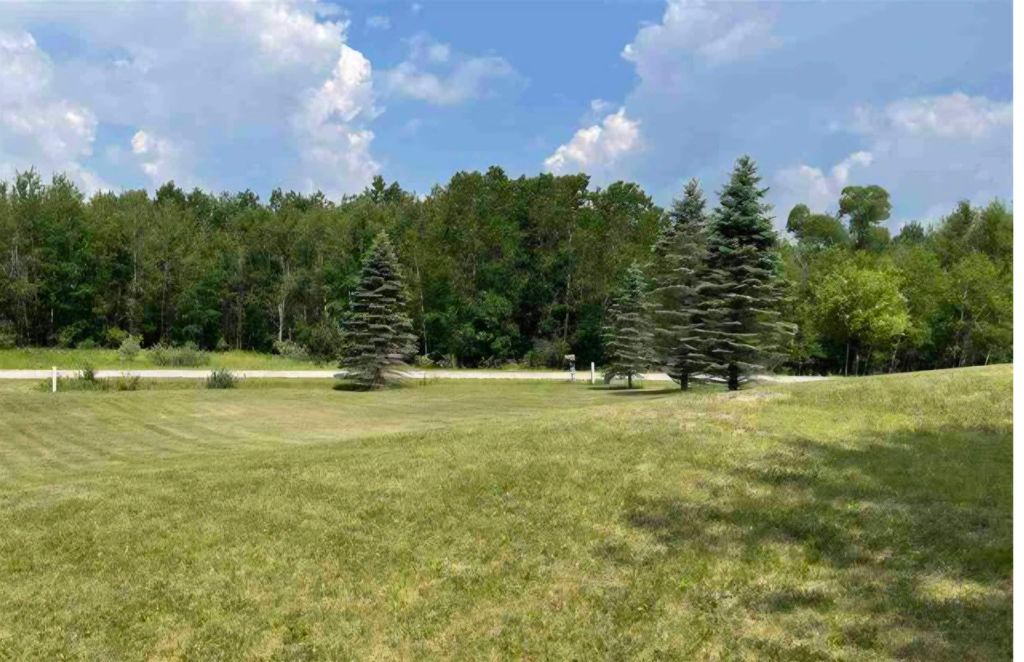 Photo of 464465 Highlanders Way #Lot 464 &amp; Lot 465 Hi, Gladwin, MI 48624 (MLS # 50206566)