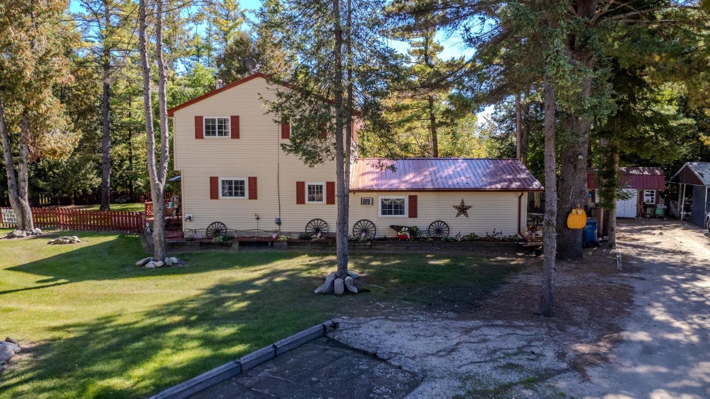 Photo of 5837 Eaton Road, Gladwin, MI 48624 (MLS # 50223379)