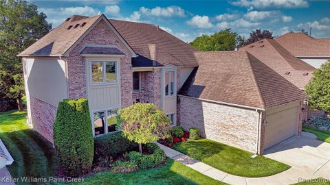 Photo of 15792 Constitution Drive, Macomb, MI 48044 (MLS # 61023657)