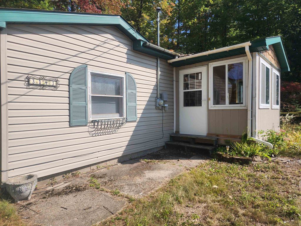 Photo of 3143 Forest Road, Harrison, MI 48625 (MLS # 50188607)