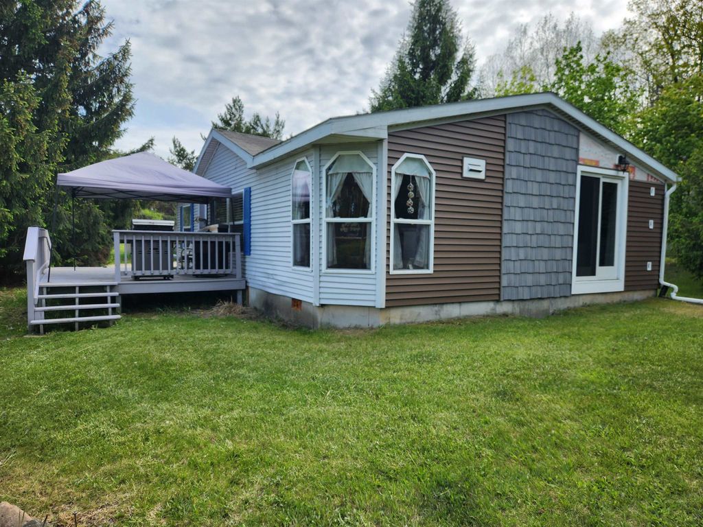 Photo of 917 Chappel Dam Road, Gladwin, MI 48624 (MLS # 50208673)