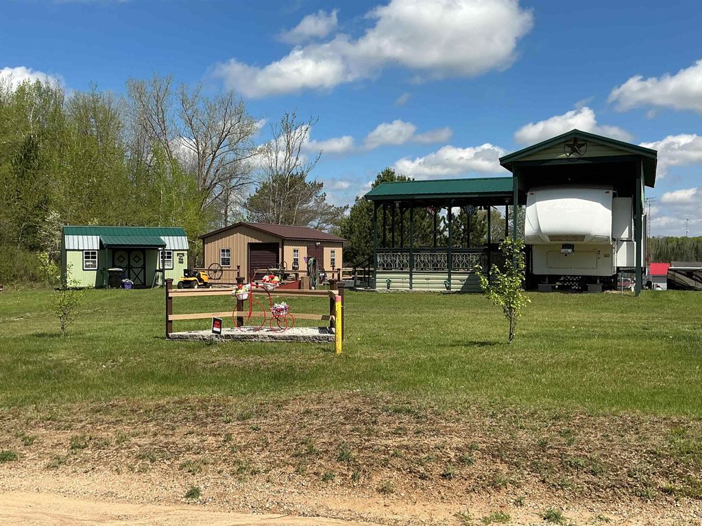 Photo of 1976 Lake Four Road, Gladwin, MI 48624 (MLS # 50202917)