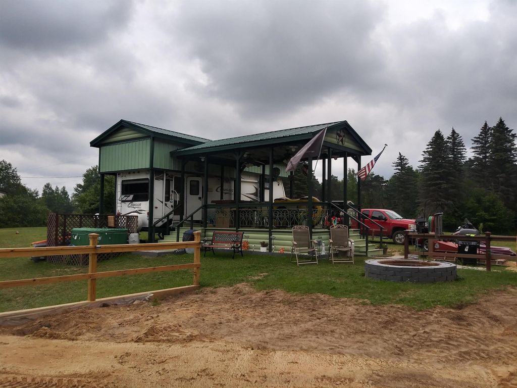 Photo of 1976 Lake Four Road, Gladwin, MI 48624 (MLS # 50202917)