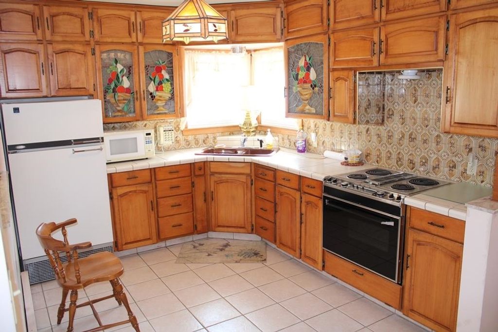 Photo of 287 E Oak Street, Harrison, MI 48625 (MLS # 50199586)