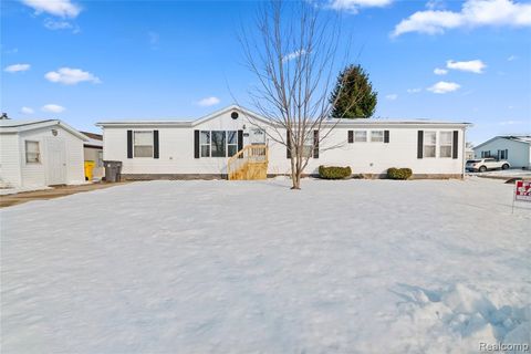 Photo of 9740 Hathaway Drive, Northville, MI 48167 (MLS # 60959878)