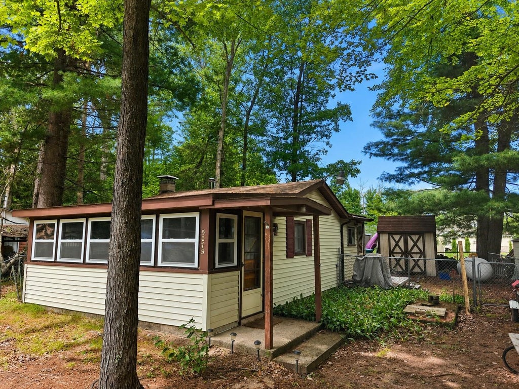 Photo of 5073 E Cranberry Lake Road, Harrison, MI 48625 (MLS # 50220792)