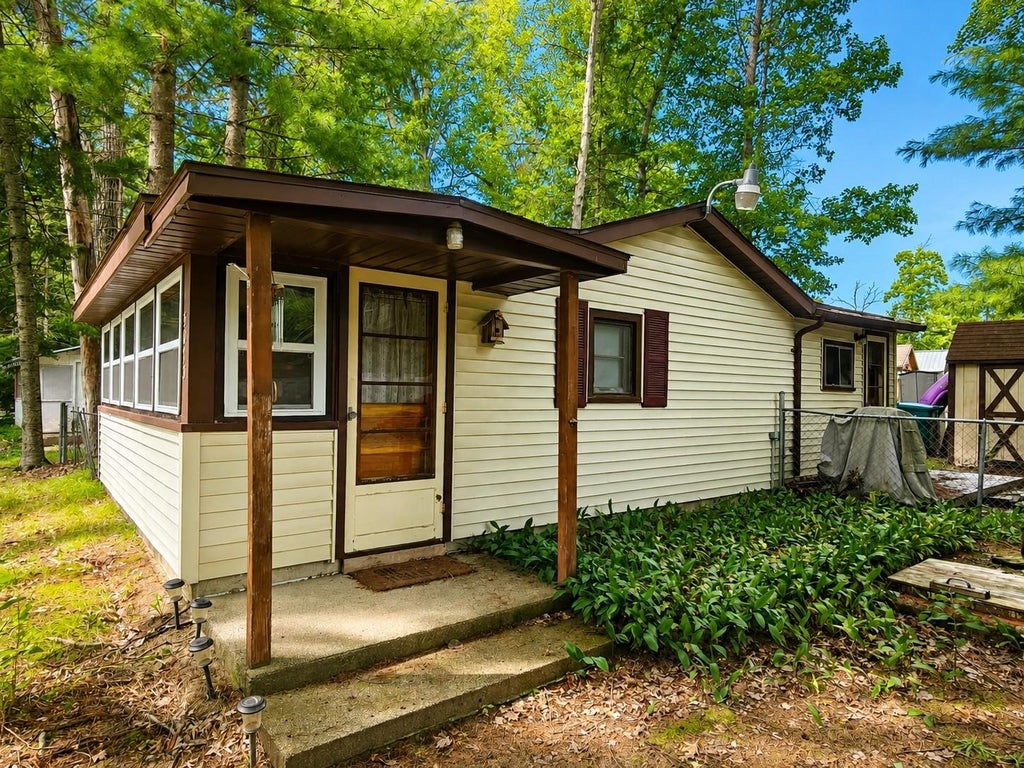 Photo of 5073 E Cranberry Lake Road, Harrison, MI 48625 (MLS # 50220792)