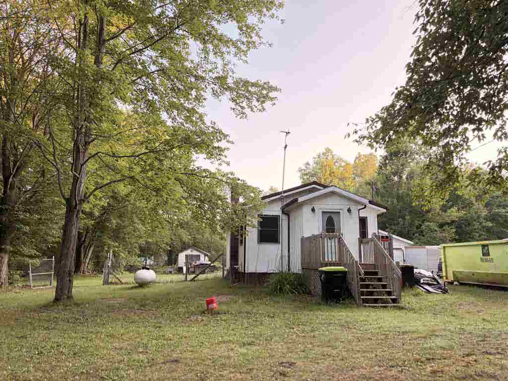 Photo of 6197 Sunrise Trail, Harrison, MI 48625 (MLS # 50217143)