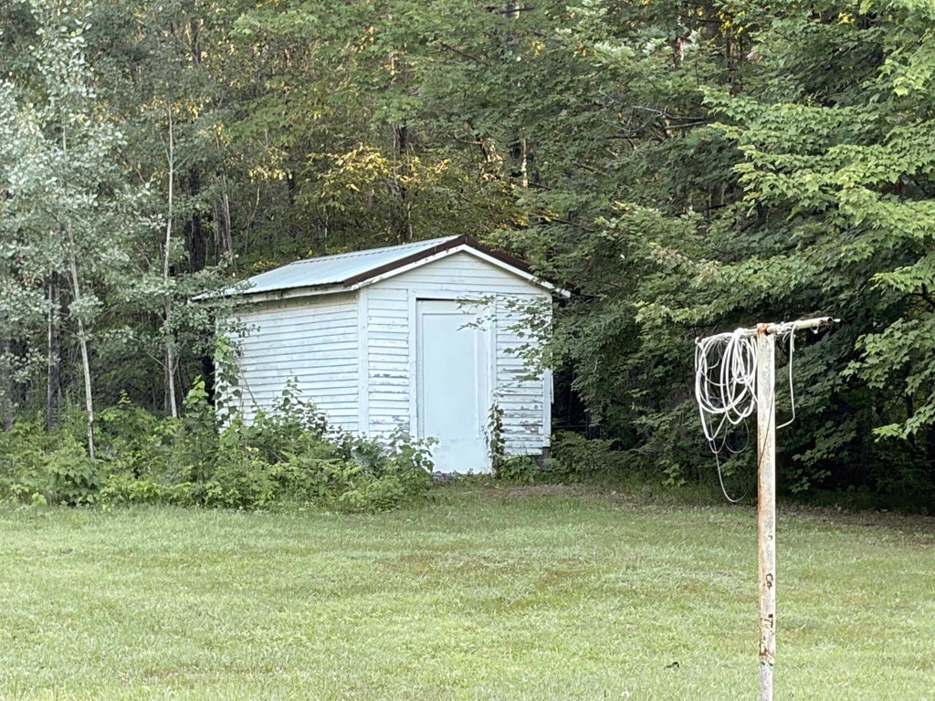 Photo of 6197 Sunrise Trail, Harrison, MI 48625 (MLS # 50217143)