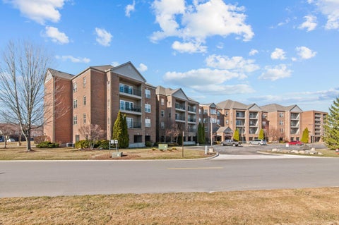 Photo of 2116 Country Club Drive Unit 9, Saint Clair Shores, MI 48082 (MLS # 50201832)