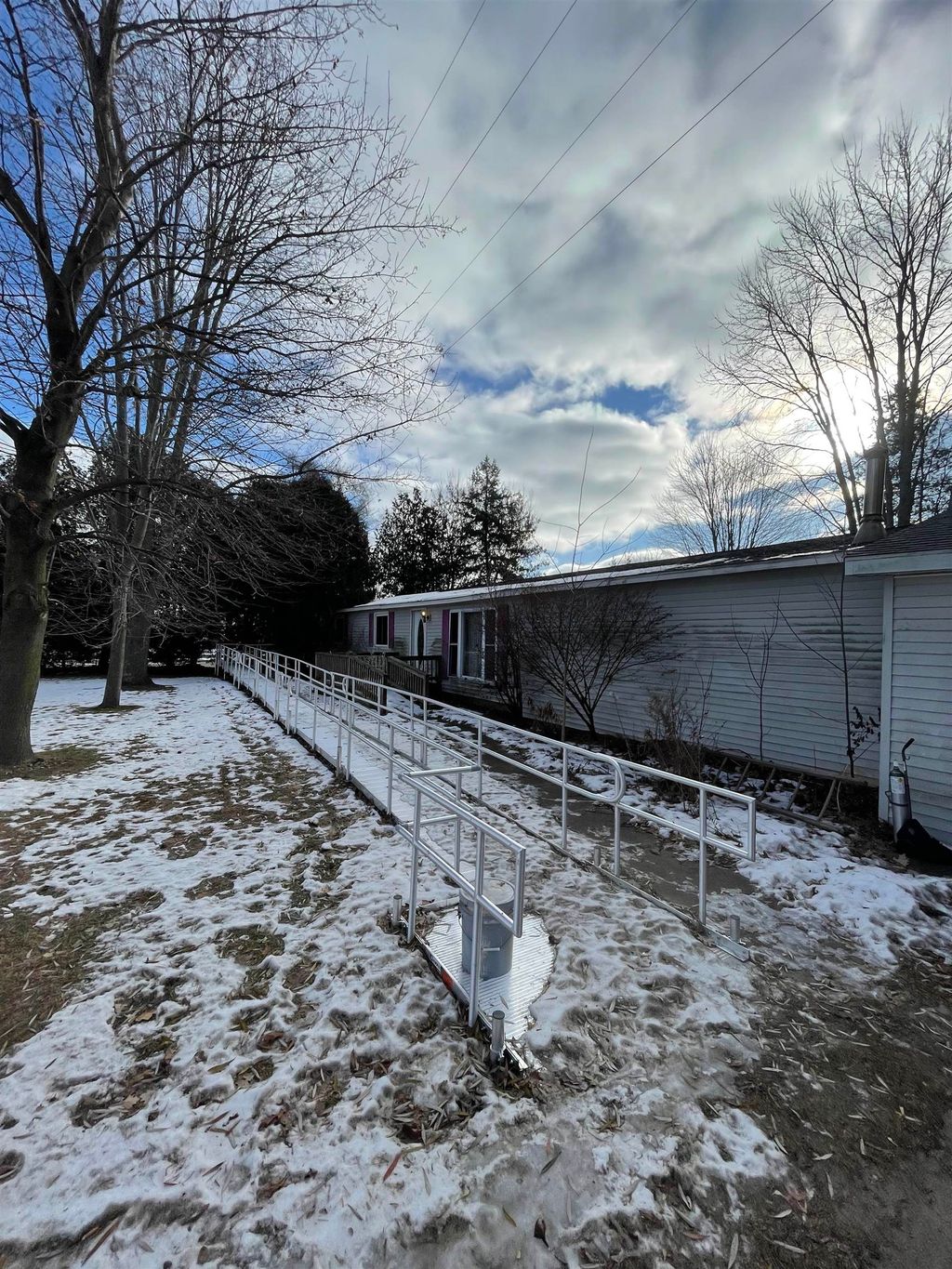 Photo of 4690 E Herrick Road, Clare, MI 48617 (MLS # 50196914)