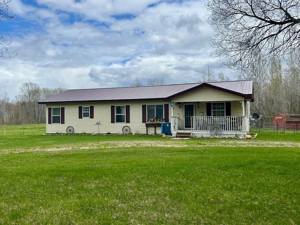 Photo of 2760 N THREE RIVERS Road, Gladwin, MI 48624 (MLS # 50206016)