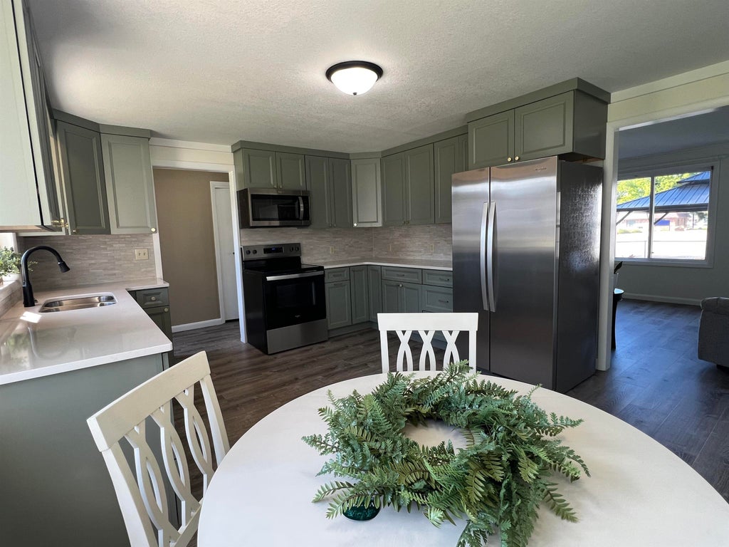 Photo of 255 E Pine Street, Harrison, MI 48625 (MLS # 50220992)