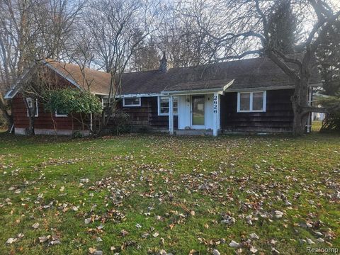 Photo of 2626 Forest Road, Lansing, MI 48910 (MLS # 60959360)