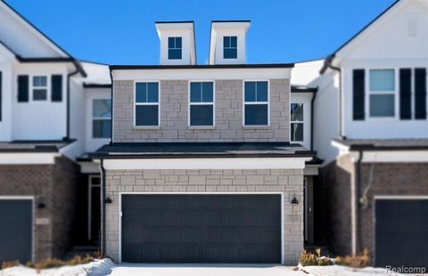 Photo of 5575 E Spaniel Drive, Ann Arbor, MI 48108 (MLS # 60959344)