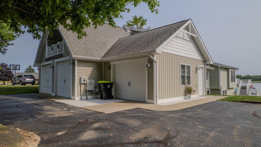 Photo of 1557 Manchester Way, Gladwin, MI 48624 (MLS # 50219174)