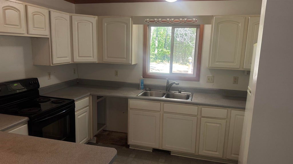 Photo of 701 Westlawn Street, Harrison, MI 48625 (MLS # 50217070)