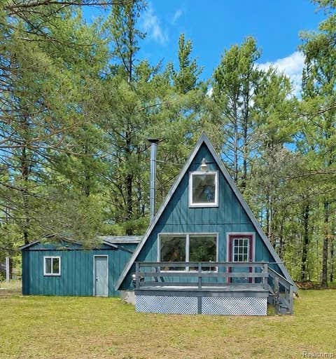 Photo of 6822 Arapahoe Trail, Gaylord, MI 49735 (MLS # 61005065)