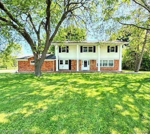 Photo of 6139 Pebbleshire Circle, Grand Blanc, MI 48439 (MLS # 60997122)