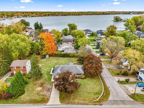 Photo of 633 S Pontiac Trail, Walled Lake, MI 48390 (MLS # 60968466)