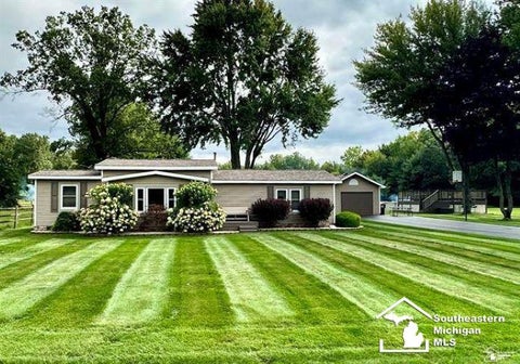 Photo of 3501 W Erie Road, Temperance, MI 48182 (MLS # 50224266)