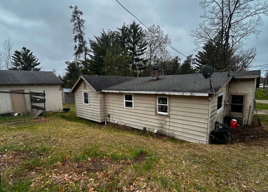Photo of 601 Eola Road, Harrison, MI 48625 (MLS # 50205941)