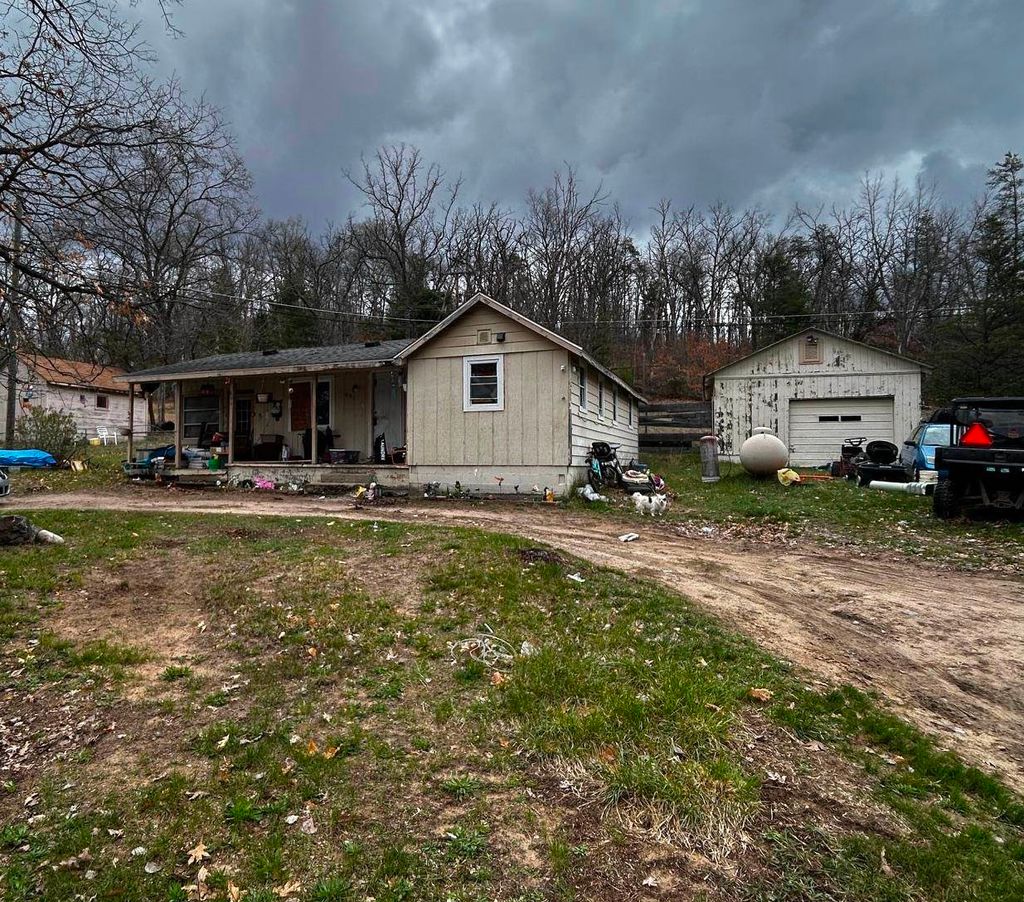 Photo of 601 Eola Road, Harrison, MI 48625 (MLS # 50205941)