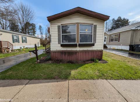 Photo of 48565 Pineview Drive, Shelby, MI 48317 (MLS # 50204060)