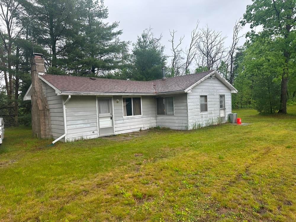 Photo of 730 W Elder Drive, Harrison, MI 48625 (MLS # 50210800)