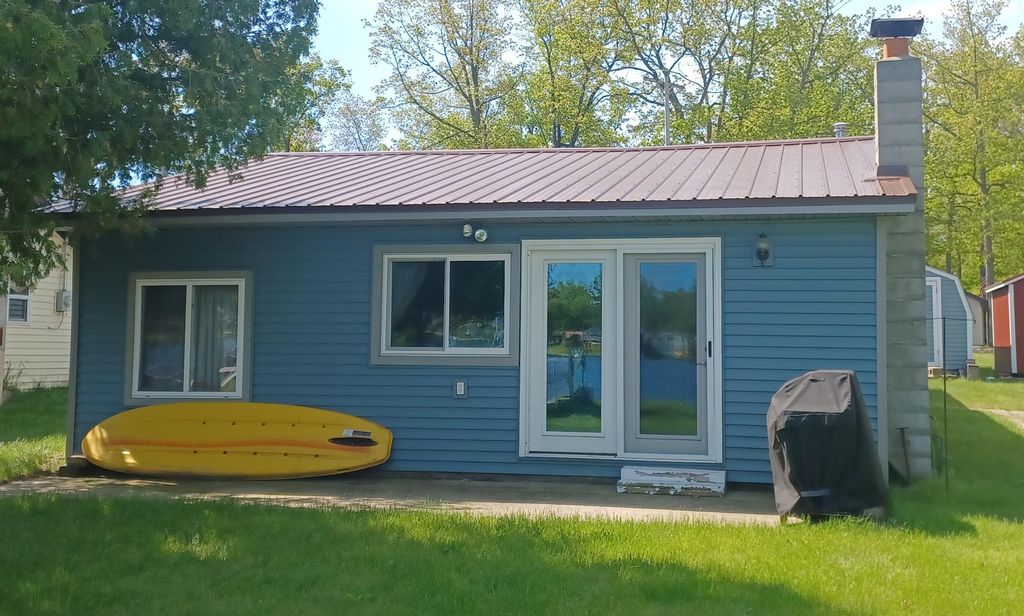 Photo of 6609 Swallow Drive, Harrison, MI 48625 (MLS # 50188653)